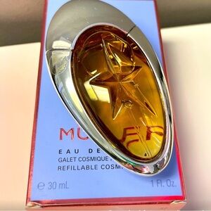 Angel Muse EDP 1oz refillable bottle with box never been used.